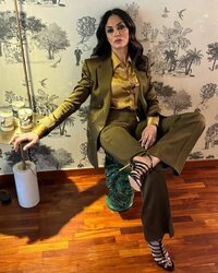 Photo by MariaGraziaCucinotta Official on September 26, 2024. May be an image of 1 person, sui...jpg