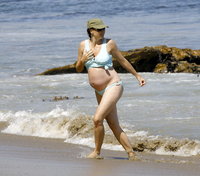 Minnie Driver - Pregnant- Bikini On The Beach - June 22 2008 -001.jpg