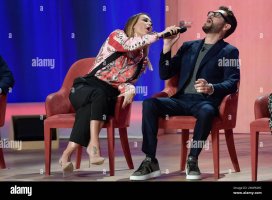 sonia-bruganelli-and-enrico-papi-attend-the-first-episode-of-the-television-program-maurizio-c...jpg